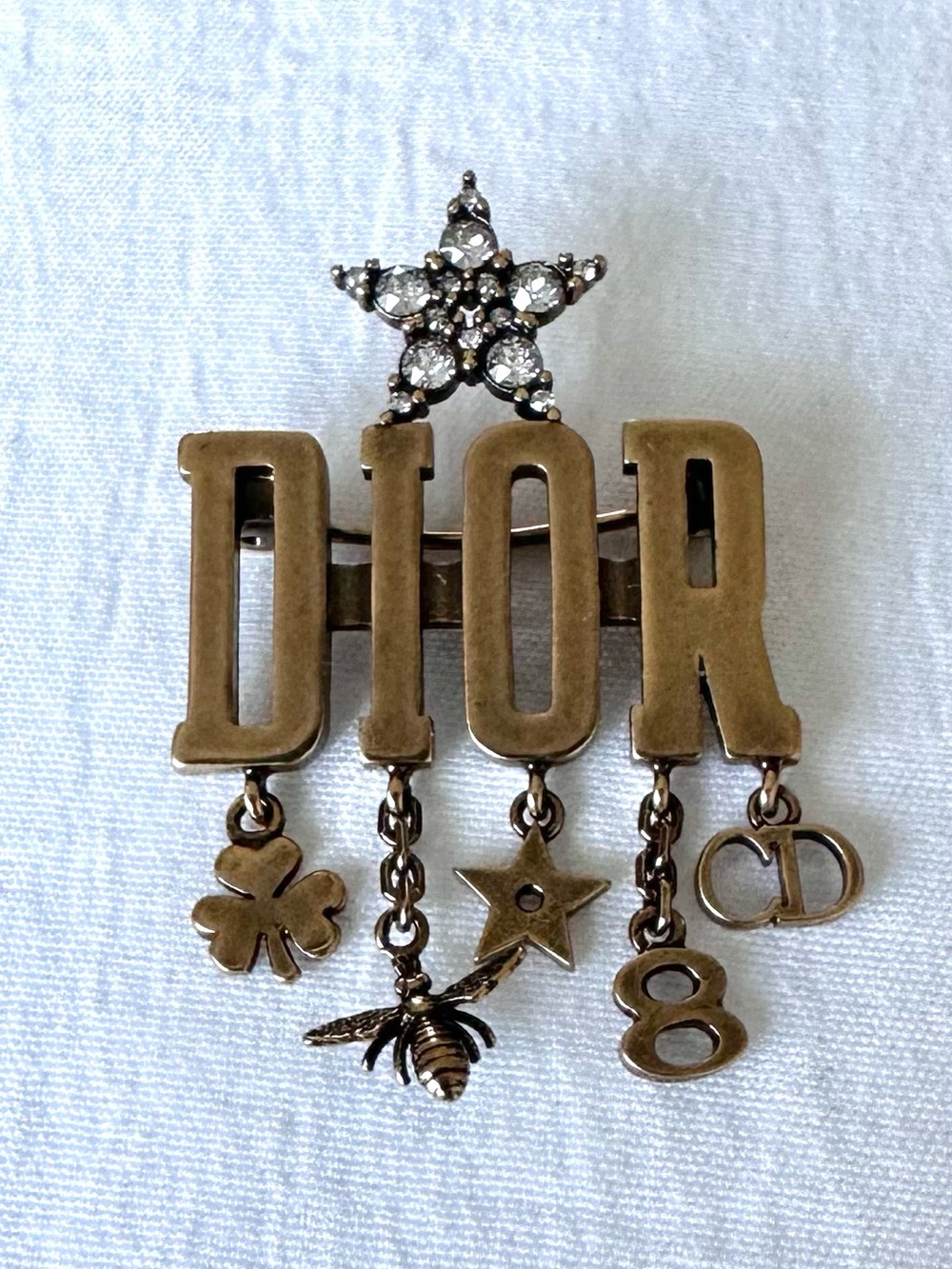 Dior Bronze-Tone Letter Pin with Crystal Star & Dangling Charms